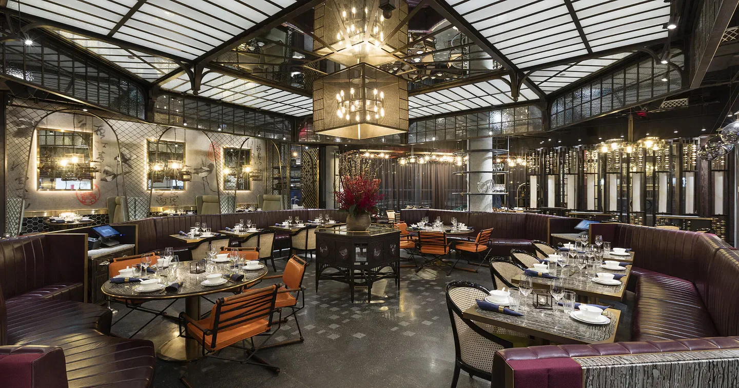 Elegant dining room interior at Mott 32 Vancouver restaurant with sophisticated design