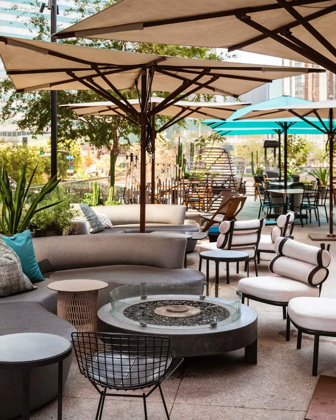 Outdoor patio at Nick Stef's Steakhouse in Los Angeles with comfortable seating and fire pit.