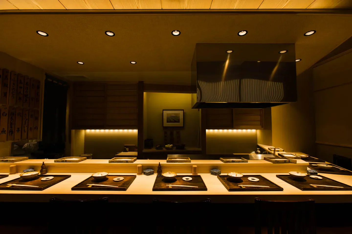 Cozy dining counter at Nihombashi Sonoji restaurant in Tokyo, ready for a meal.