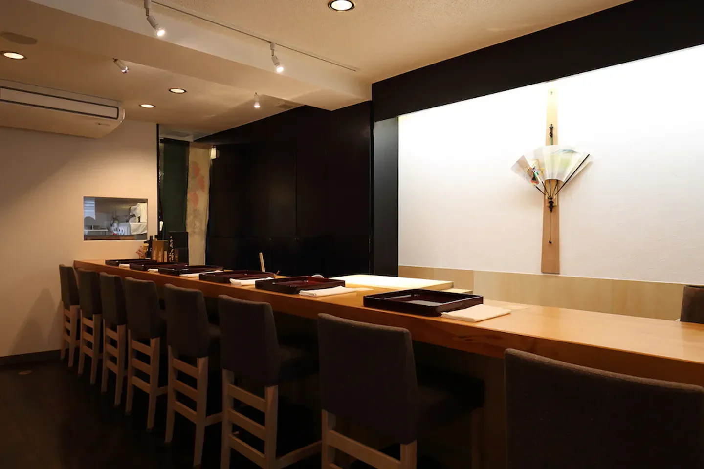Interior of Nishiazabu Otake restaurant in Tokyo, featuring sushi bar and elegant design