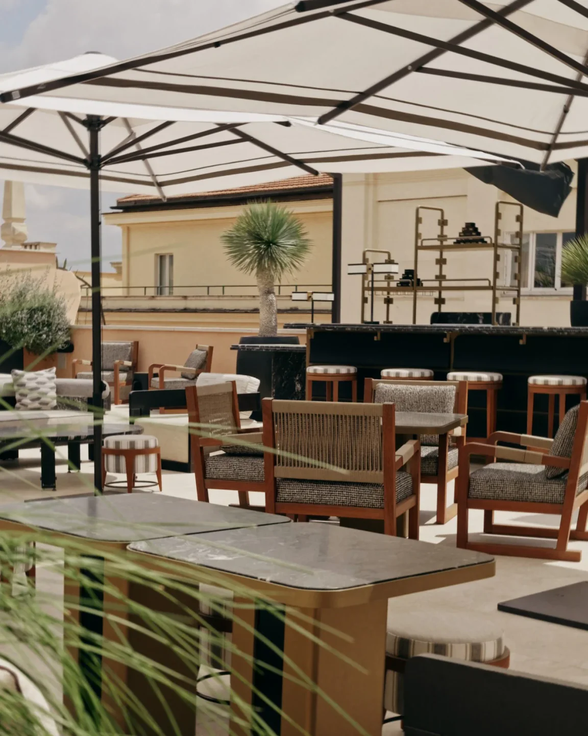 Chic outdoor seating area at Nobu Roma, a stylish restaurant in the city.