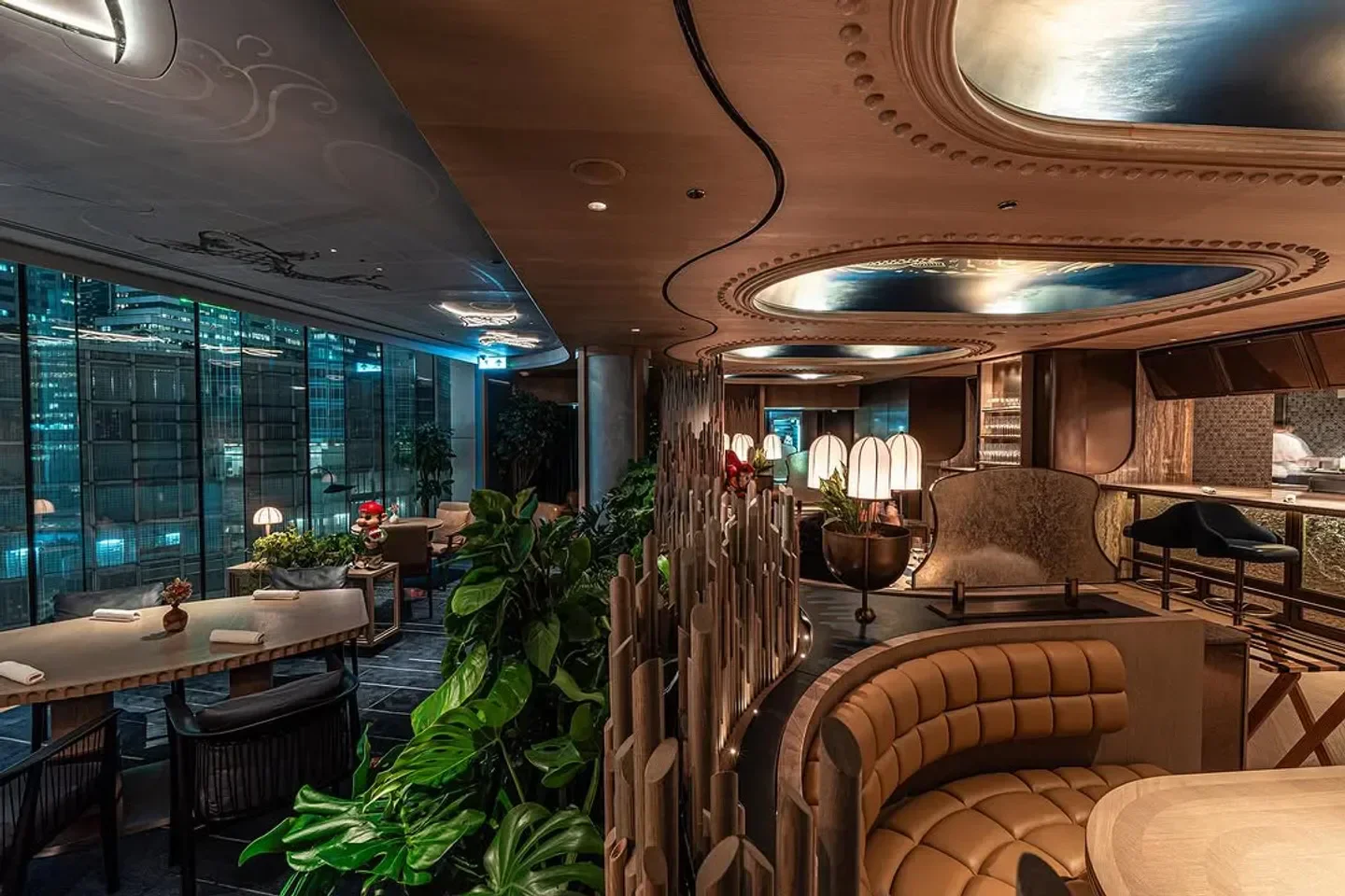 Stylish interior of Noi by Paulo Airaudo in Hong Kong, with city views and elegant decor.