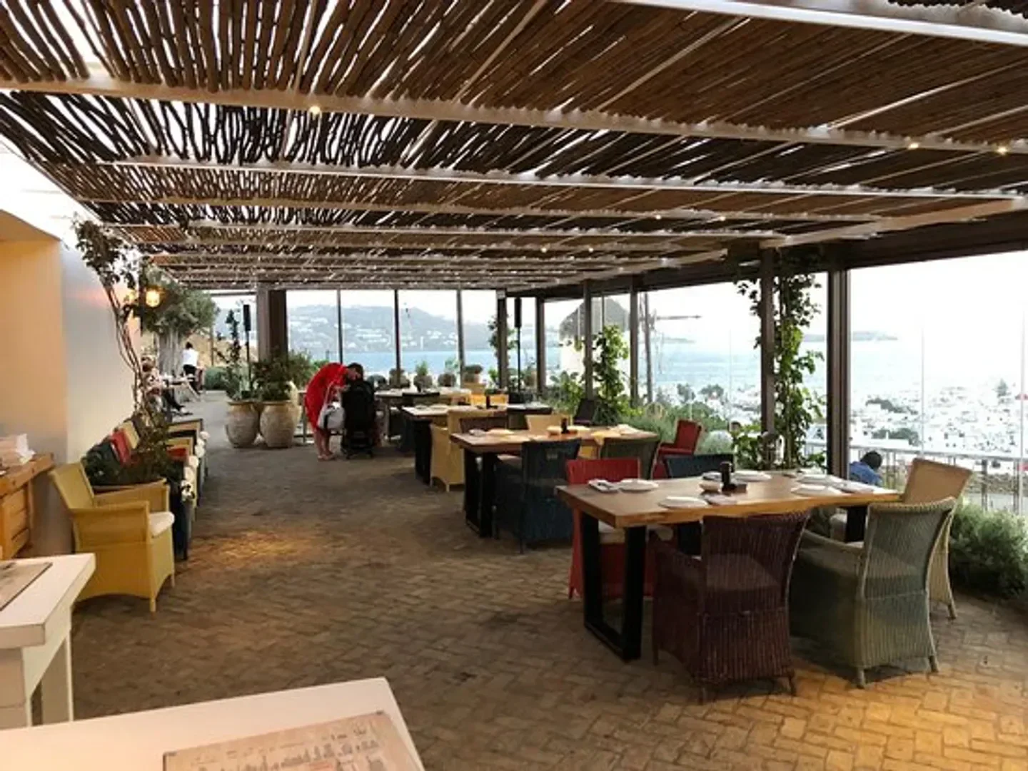 Nusr-Et Mykonos: Stylish restaurant terrace with scenic views of the island.