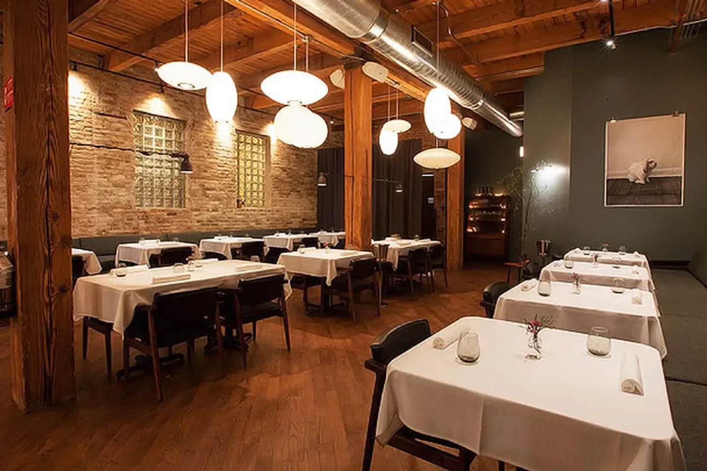 Interior of Oriole restaurant in Chicago, with elegant dining tables and ambiance.
