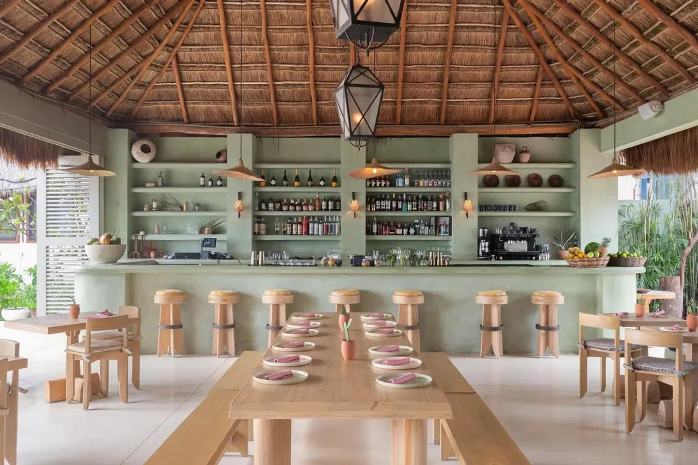 Interior of Panamera restaurant in Tulum, showcasing the bar and dining area.
