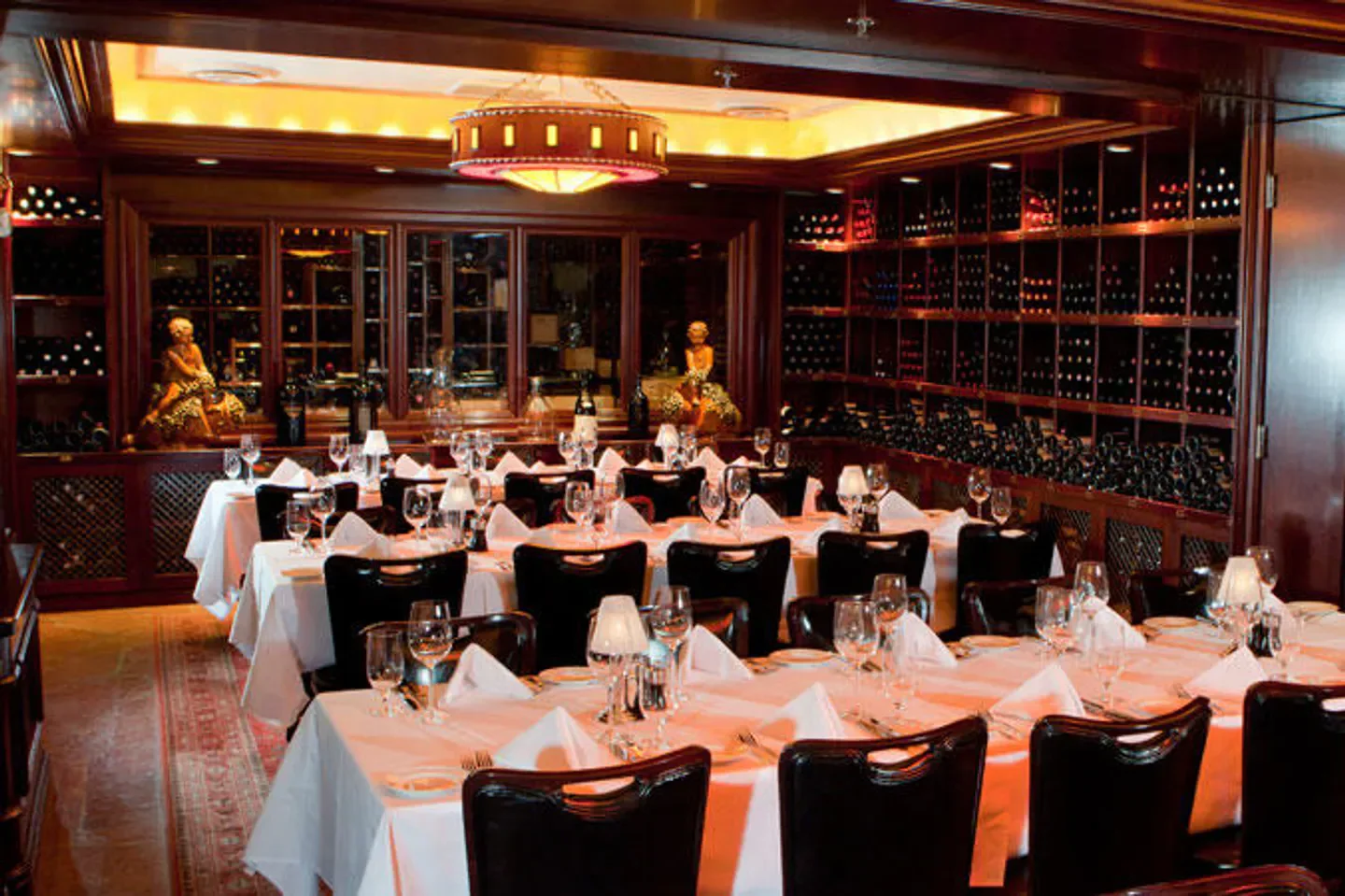 Elegant dining room at Pappas Bros. Steakhouse - Dallas, with wine selection in Dallas.