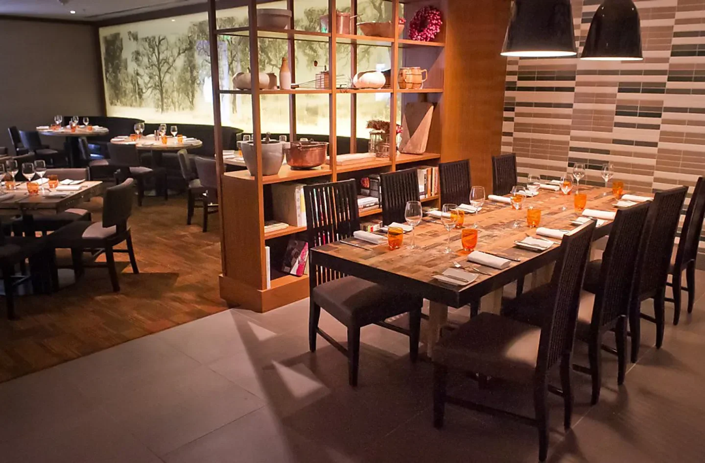 Dining area at Parallel 37 restaurant in San Francisco with long table set for a meal