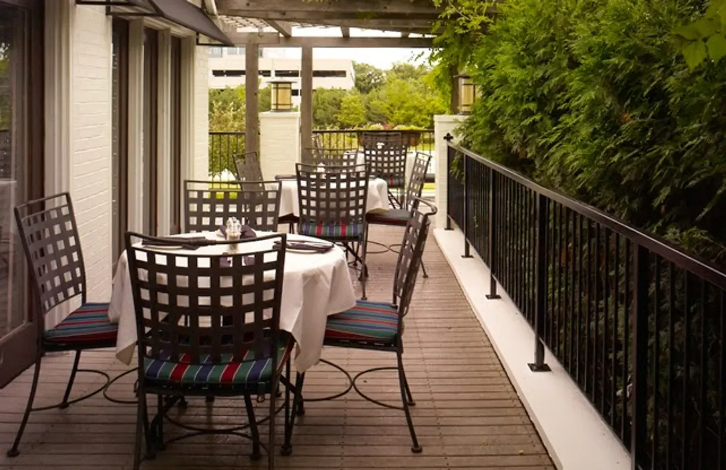 Outdoor dining at Parkers' Restaurant & Bar in Chicago, with tables and chairs.