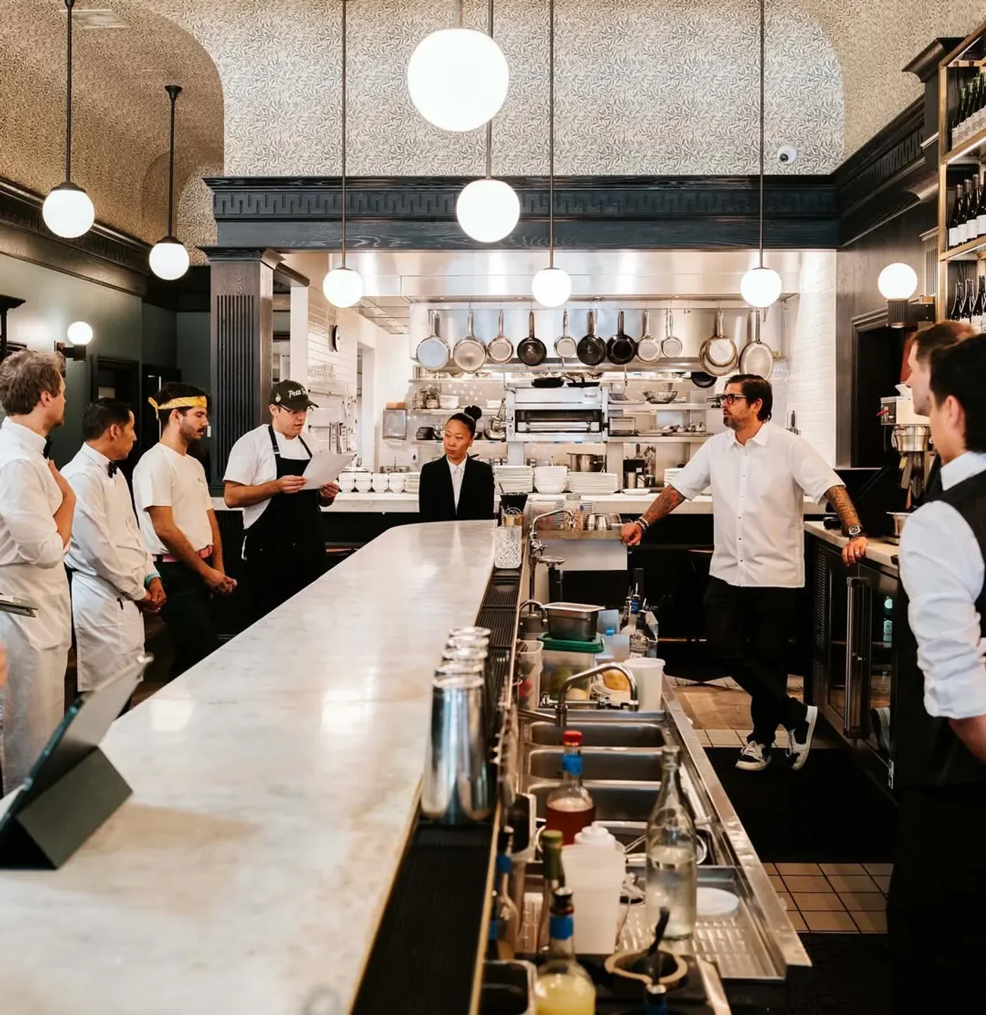 Chefs at Petit Trois - Los Angeles kitchen, restaurant interior in Los Angeles.
