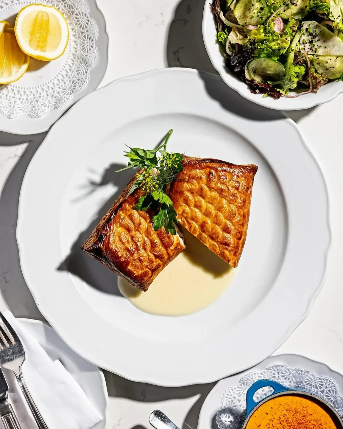 Delicious pastry dish at Petite Cerise restaurant in Washington, served on a white plate.
