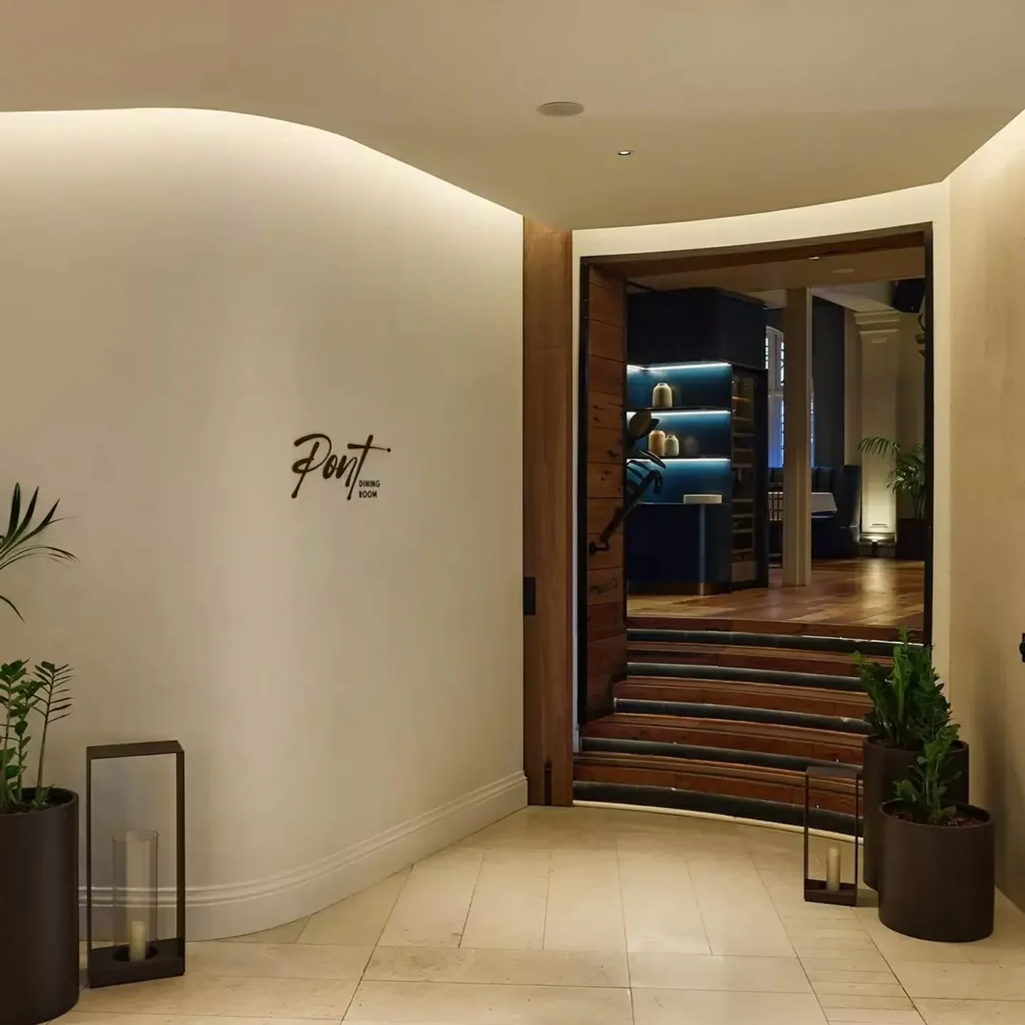 Entrance of Pont Dining Room in Sydney, with stylish design and warm lighting