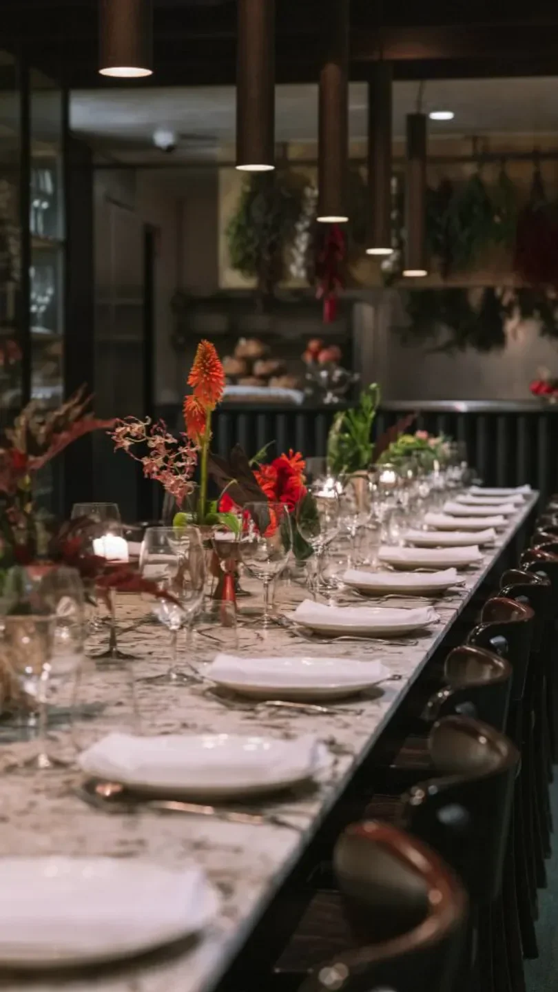 Elegant dining table set for dinner at Porteño, a popular restaurant in Sydney.