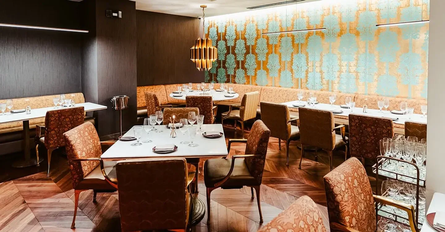 Elegant interior of Rania restaurant in Washington, featuring stylish seating and decor.
