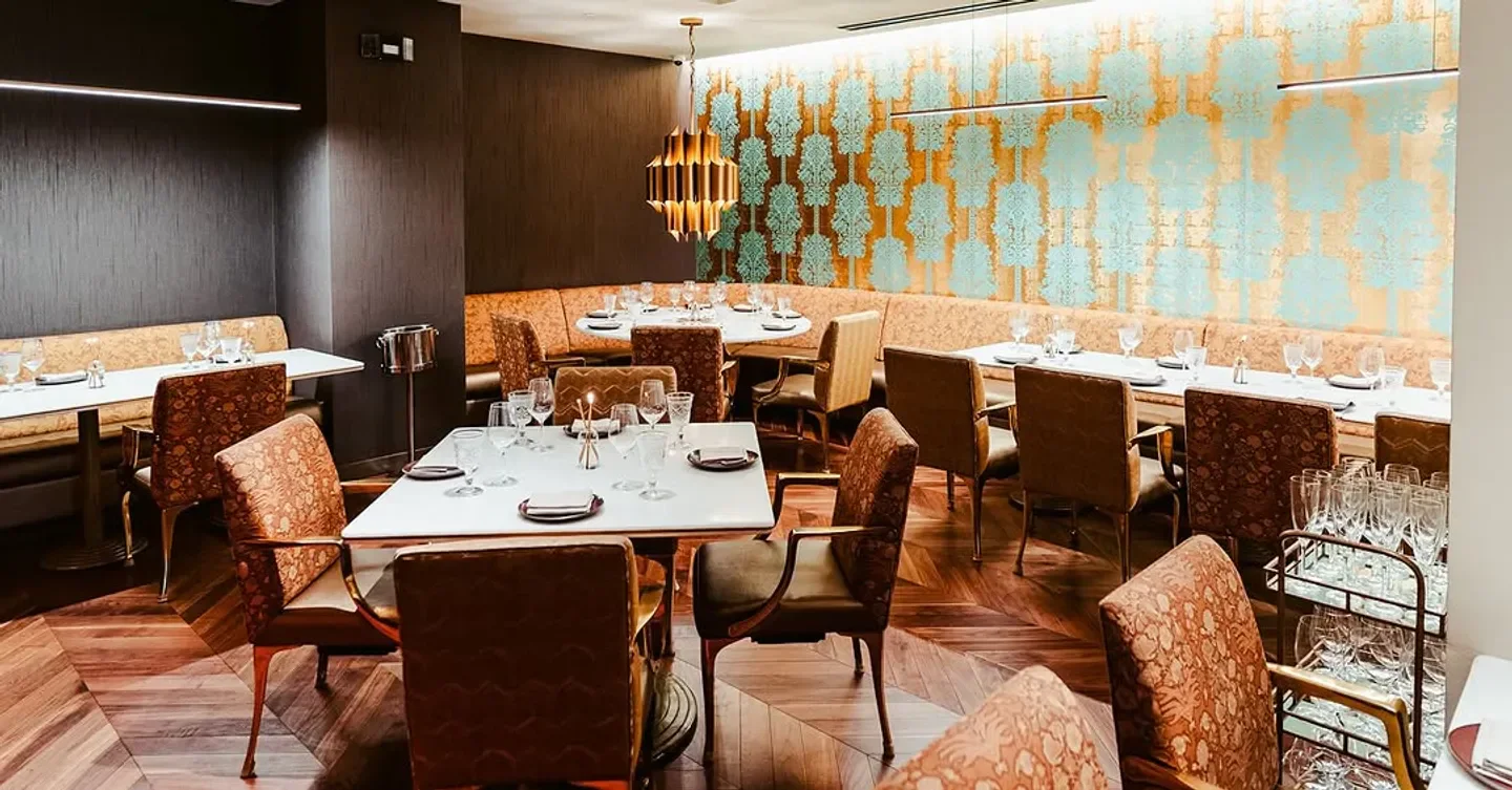 Elegant interior of Rania restaurant in Washington, featuring stylish seating and decor.