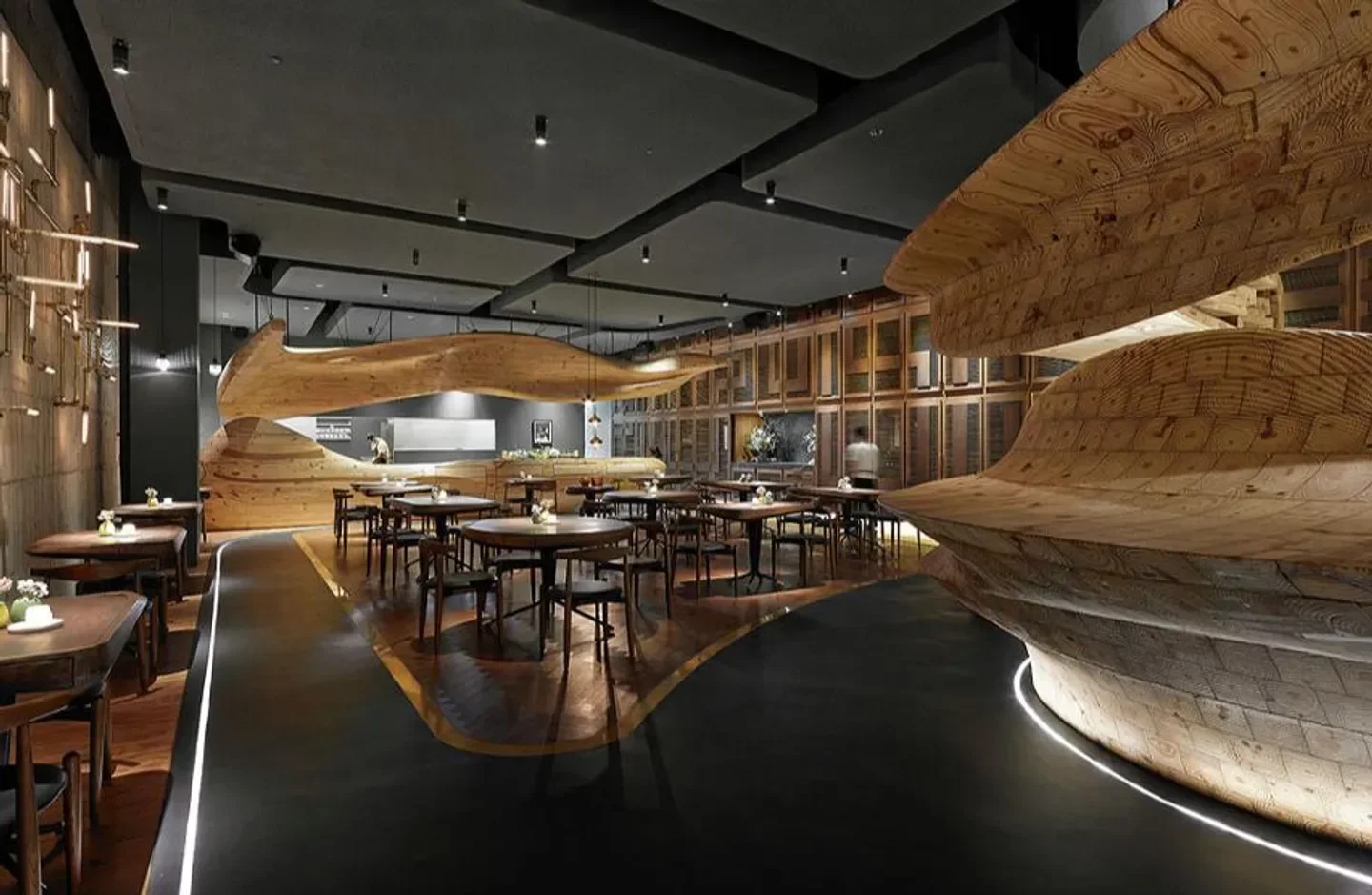 Modern interior of RAW restaurant in Taipei, featuring unique wooden architectural elements.