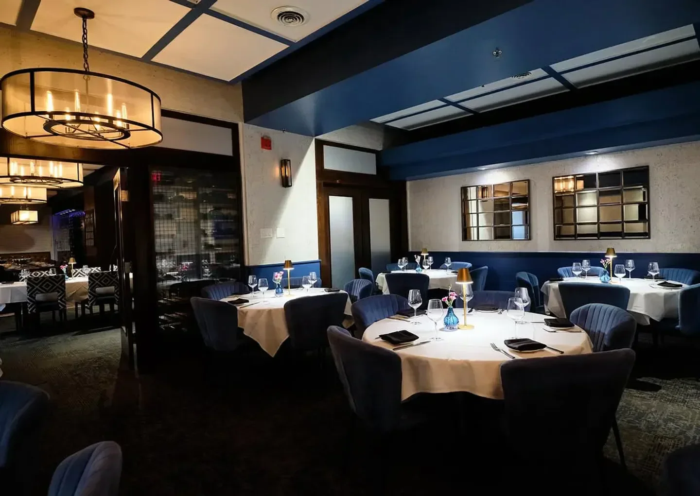 Interior of Ray's In the City restaurant in Atlanta, featuring elegant dining tables and decor.