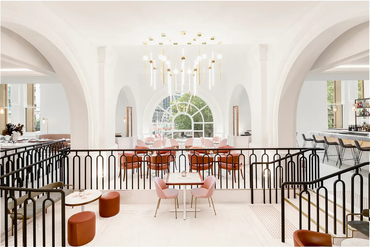 Elegant dining area at Reign at the QVB restaurant in Sydney, featuring stylish decor.