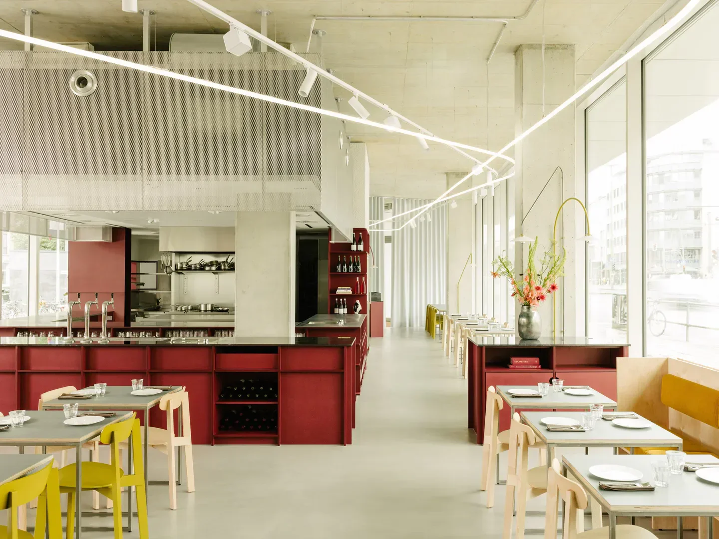 Modern interior of Remi restaurant in Berlin, featuring stylish decor and dining tables.