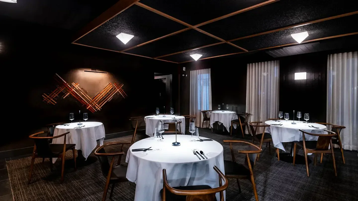 Elegant dining room interior at Reverie restaurant in Washington with stylish decor.