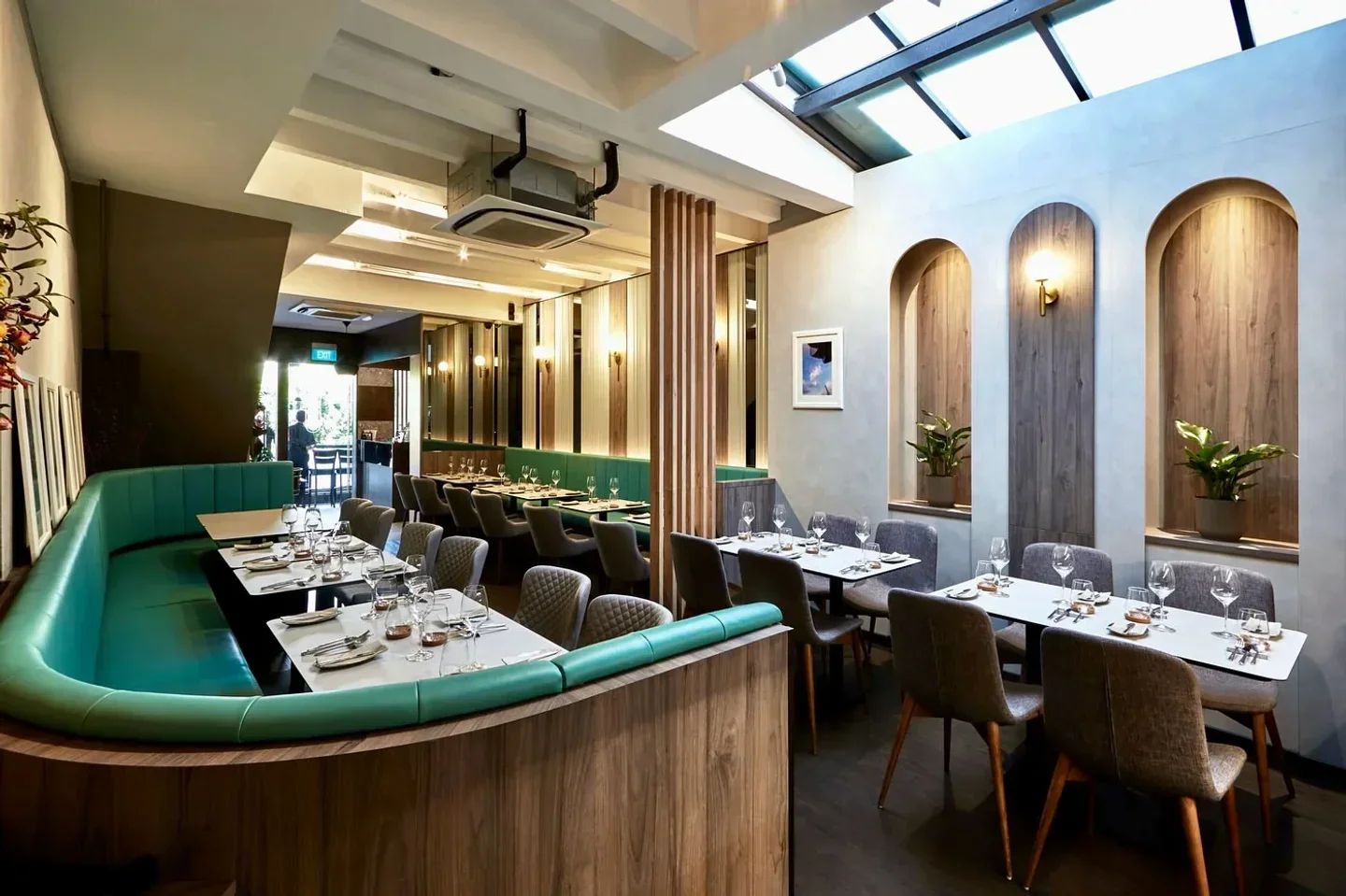 Stylish interior of Rhubarb restaurant in Singapore, showcasing modern dining space and decor.