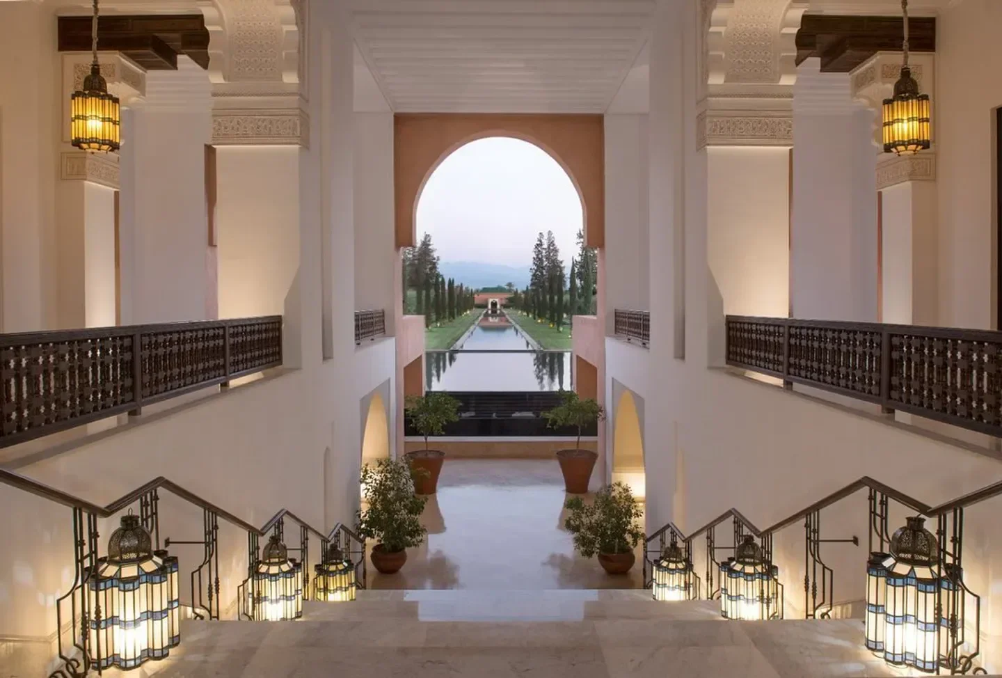 Rivayat restaurant in Marrakech: Grand staircase leading to a serene exterior view