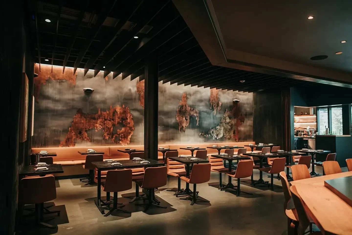 Interior of Robin restaurant in San Francisco, featuring unique wall art and seating.