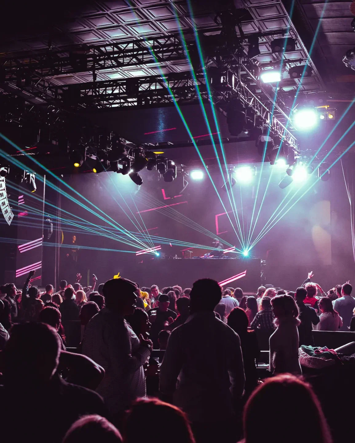 Energetic crowd at Royale nightclub in Boston, enjoying a laser light show.