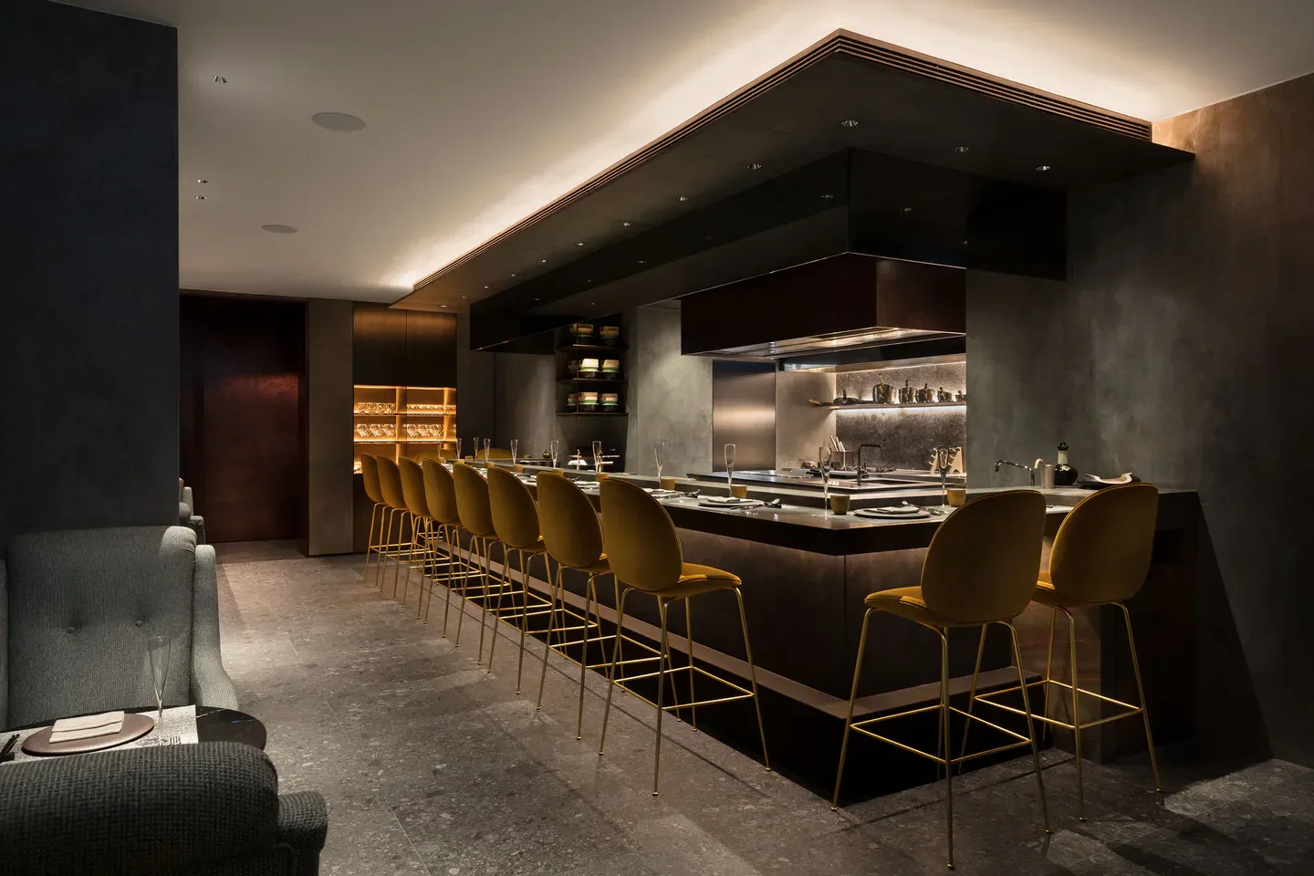 Interior of Ryota Kappou Modern restaurant in Hong Kong with bar seating and kitchen