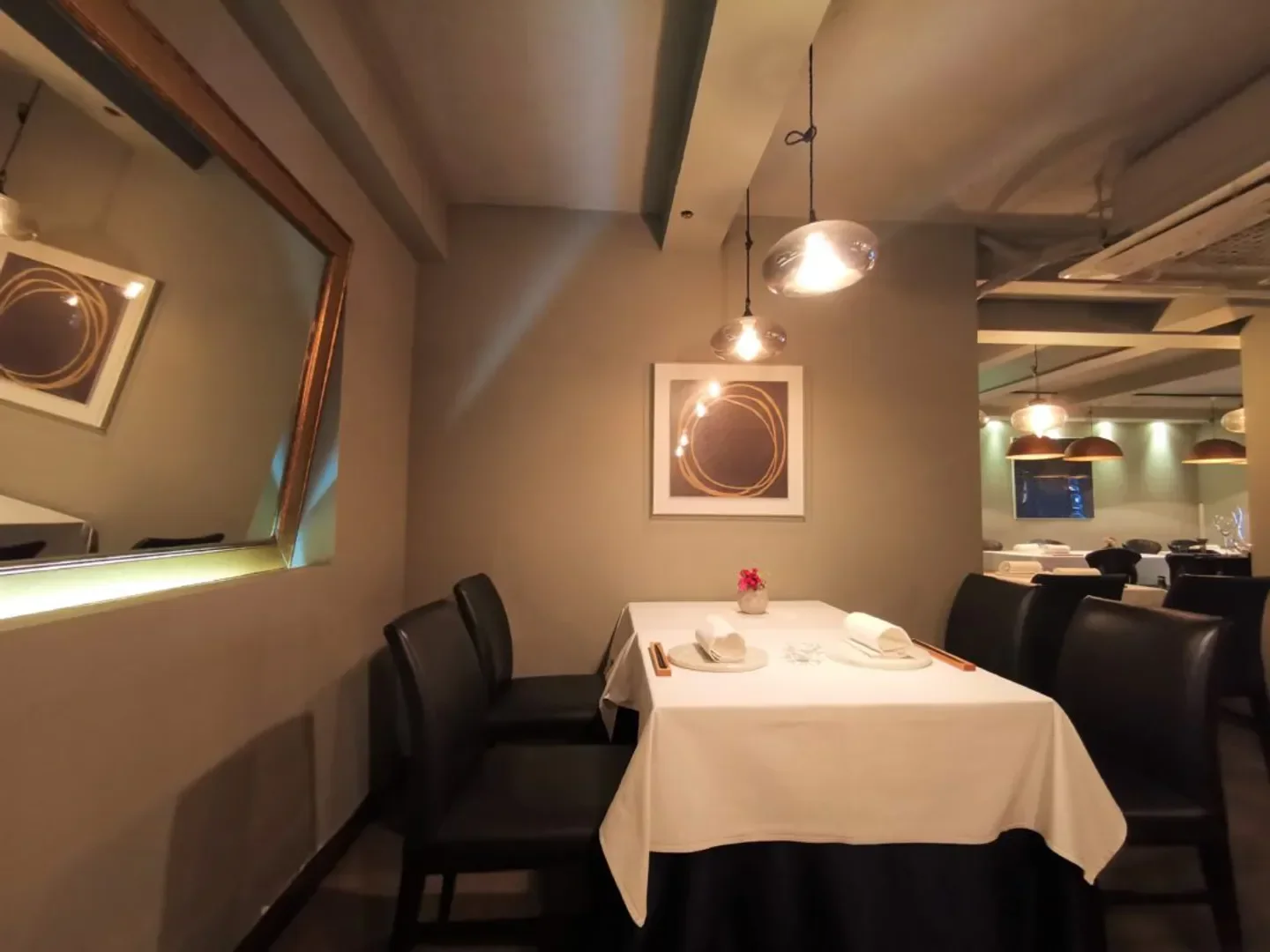 Cozy dining area at Ryunique restaurant in Seoul, featuring elegant table setting.