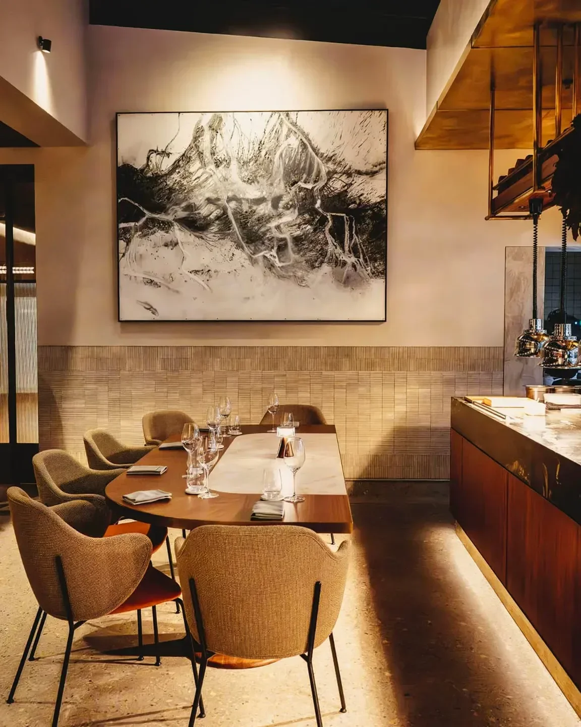 Elegant dining at Saint Peter restaurant in Sydney, featuring a modern table setting.