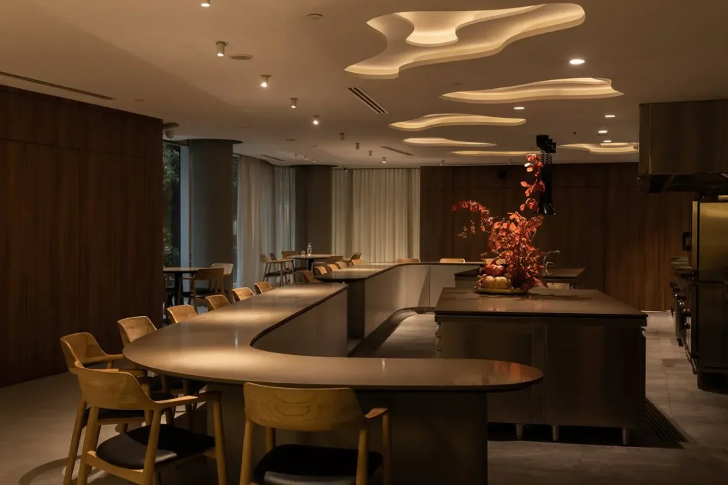 Interior of Seroja restaurant in Singapore, featuring unique ceiling design and seating.