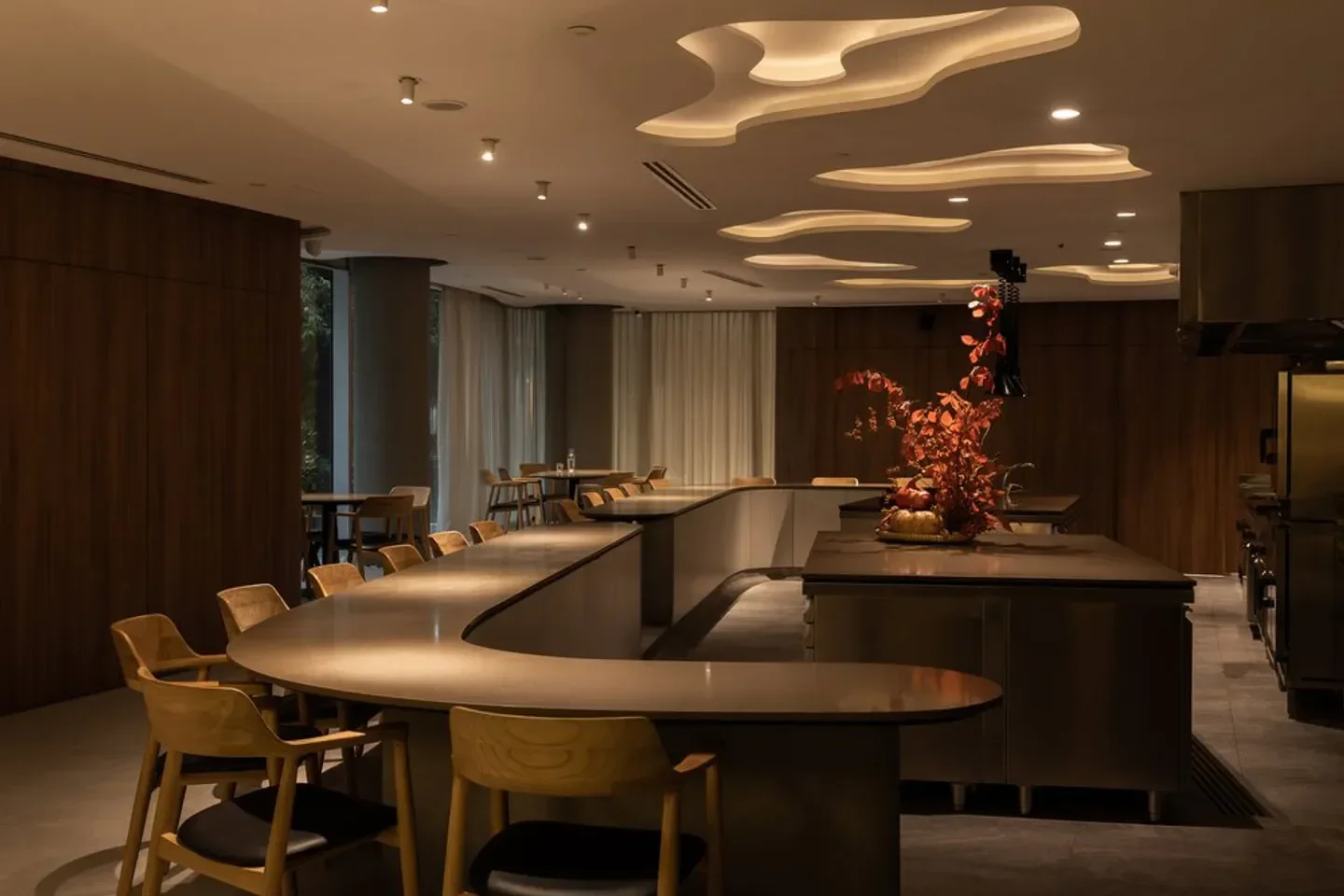 Interior of Seroja restaurant in Singapore, featuring unique ceiling design and seating.