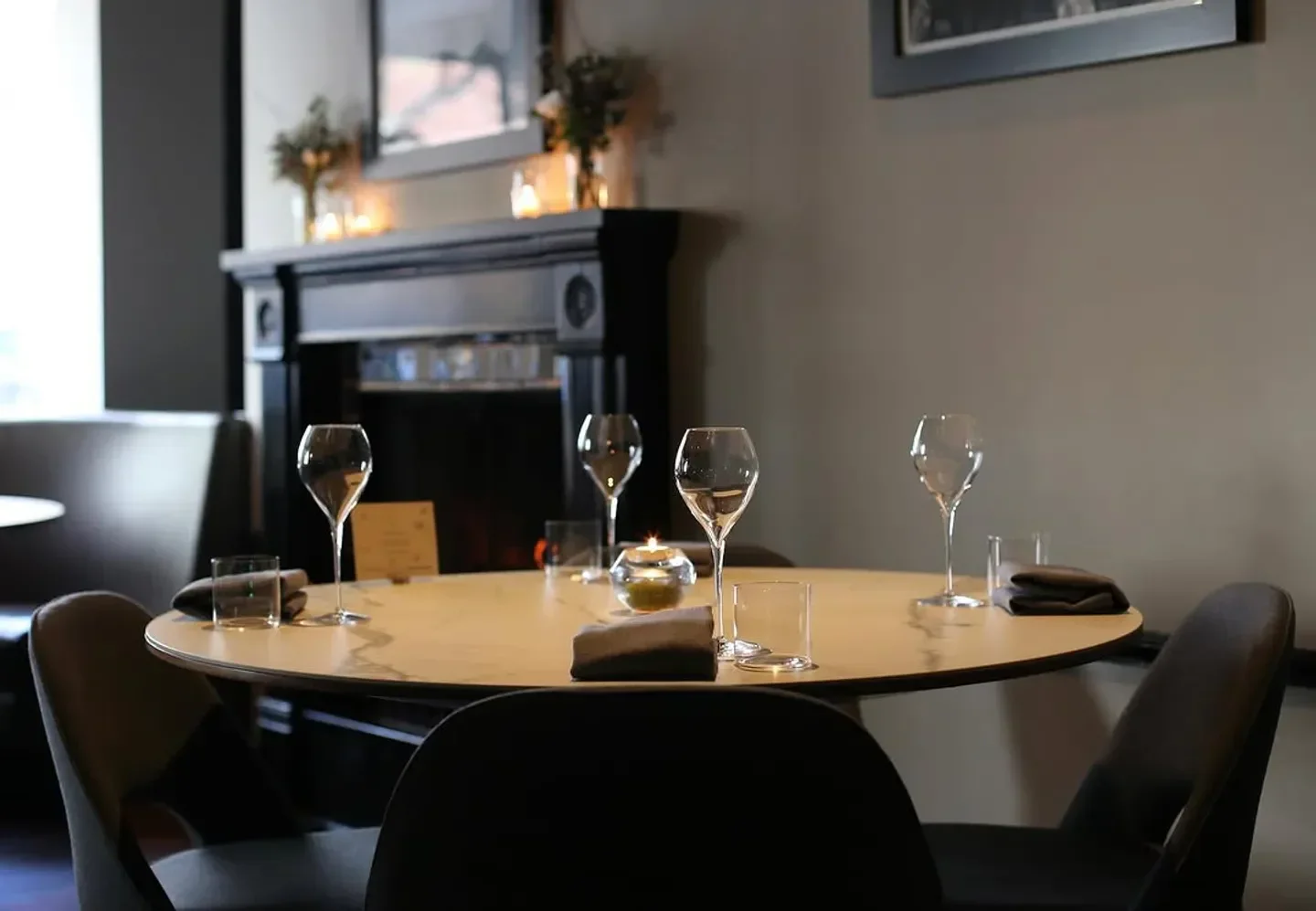 Elegant dining table setting at Sons & Daughters restaurant in San Francisco.