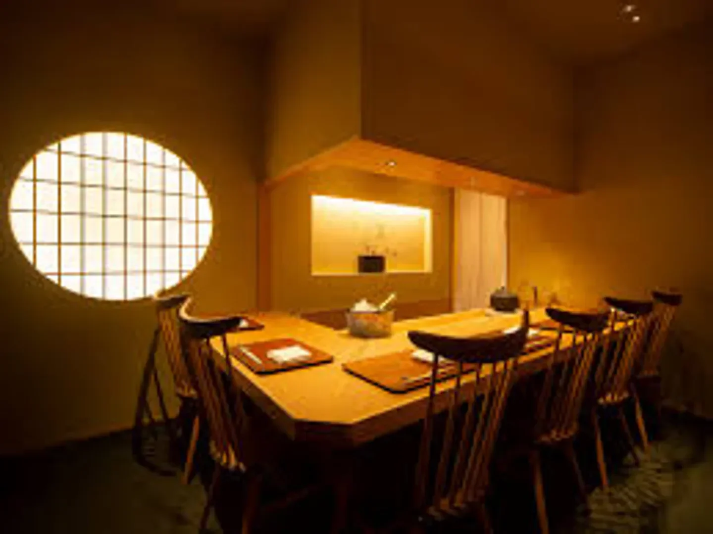 Interior of Sorahana restaurant in Tokyo, showcasing elegant wood design and ambiance.
