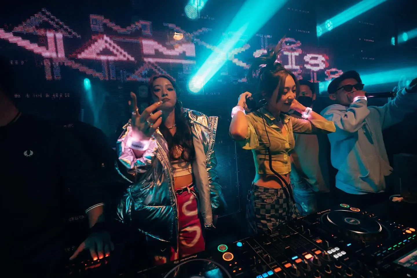 Energetic night at Space Club in Hong Kong with DJs and a vibrant atmosphere