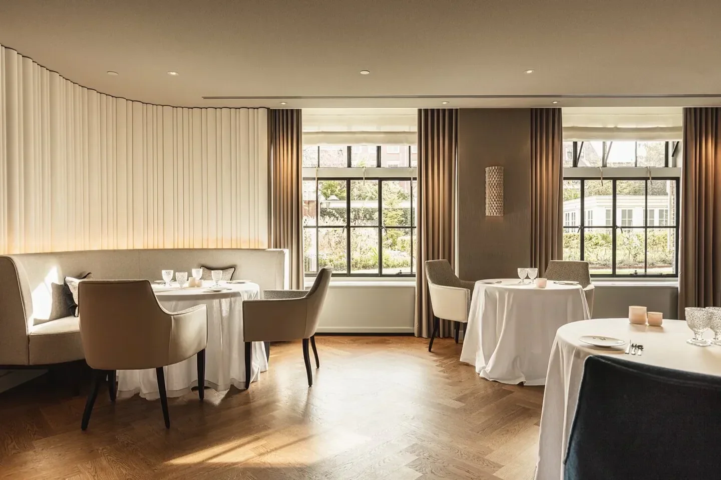Elegant dining room interior at Spectrum restaurant in Amsterdam with natural light
