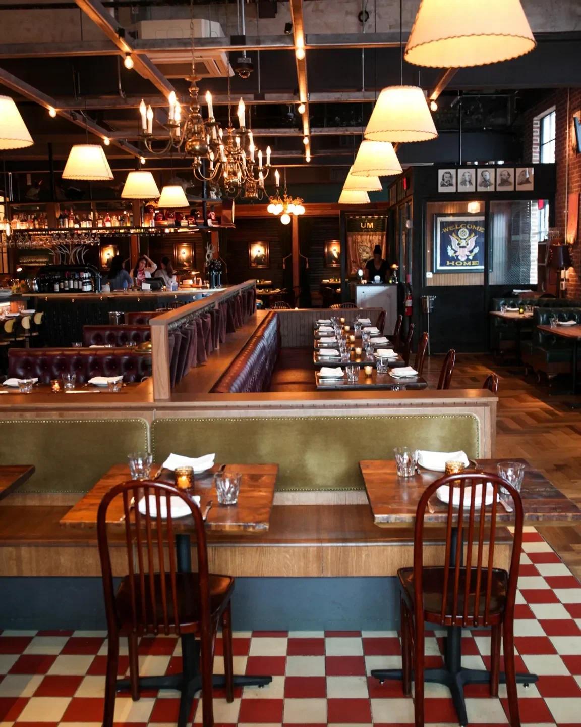 Interior view of St. Anselm restaurant in Washington, showcasing cozy seating and elegant lighting.