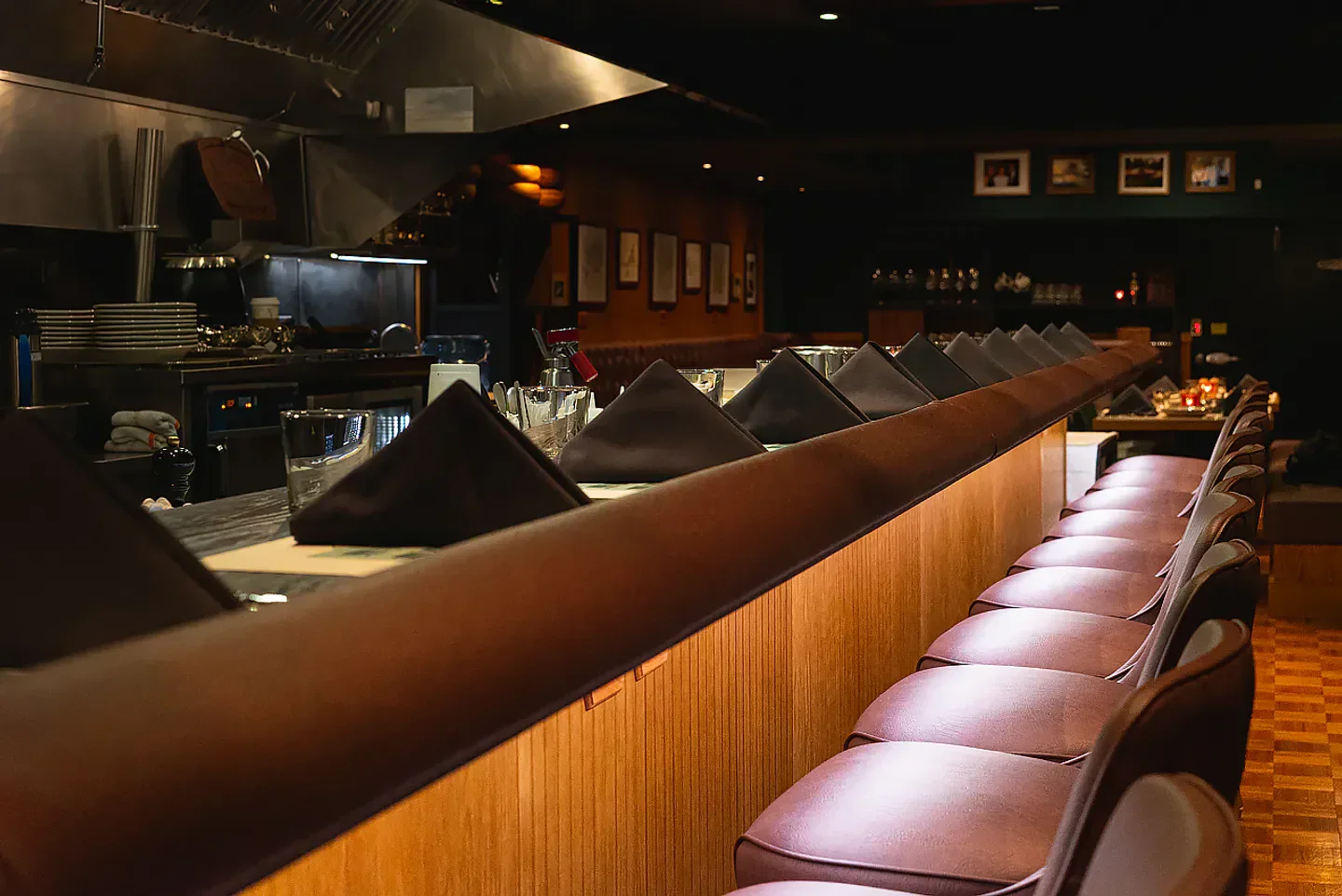 Cozy bar seating at St. Clair Supper Club in Chicago, with a focus on details.