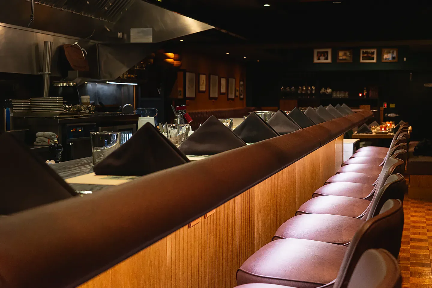 Cozy bar seating at St. Clair Supper Club in Chicago, with a focus on details.
