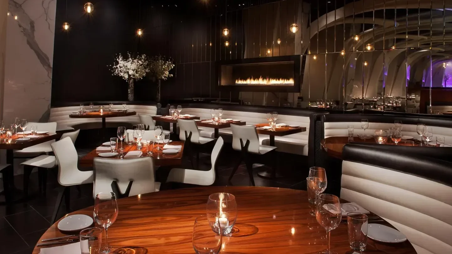 STK Toronto's stylish dining room, with warm lighting and inviting ambiance.