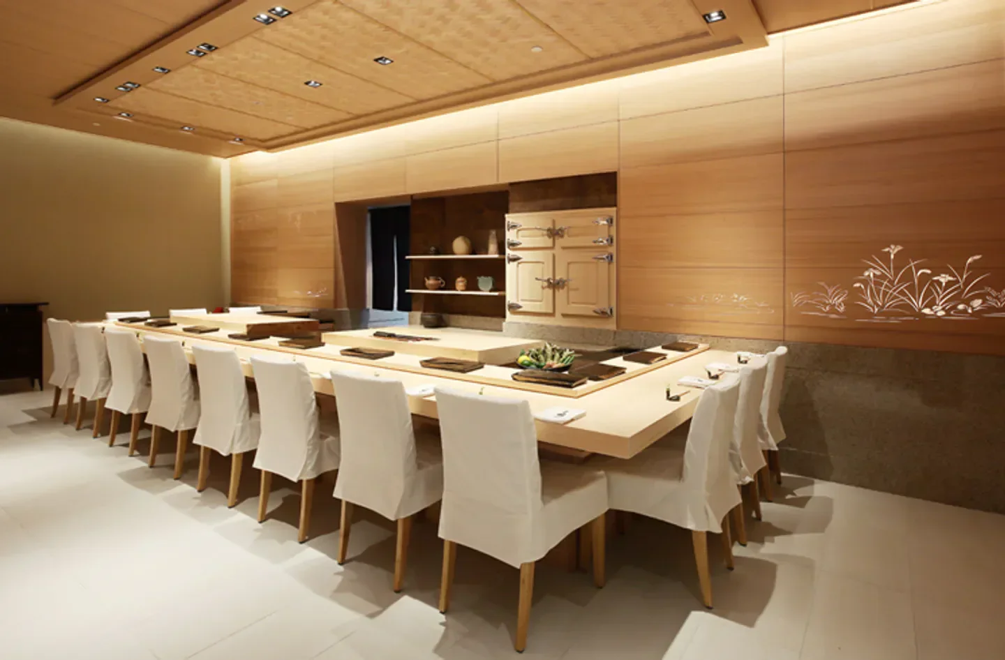 Interior of Sushi Ichi restaurant in Singapore, showcasing minimalist design and seating.