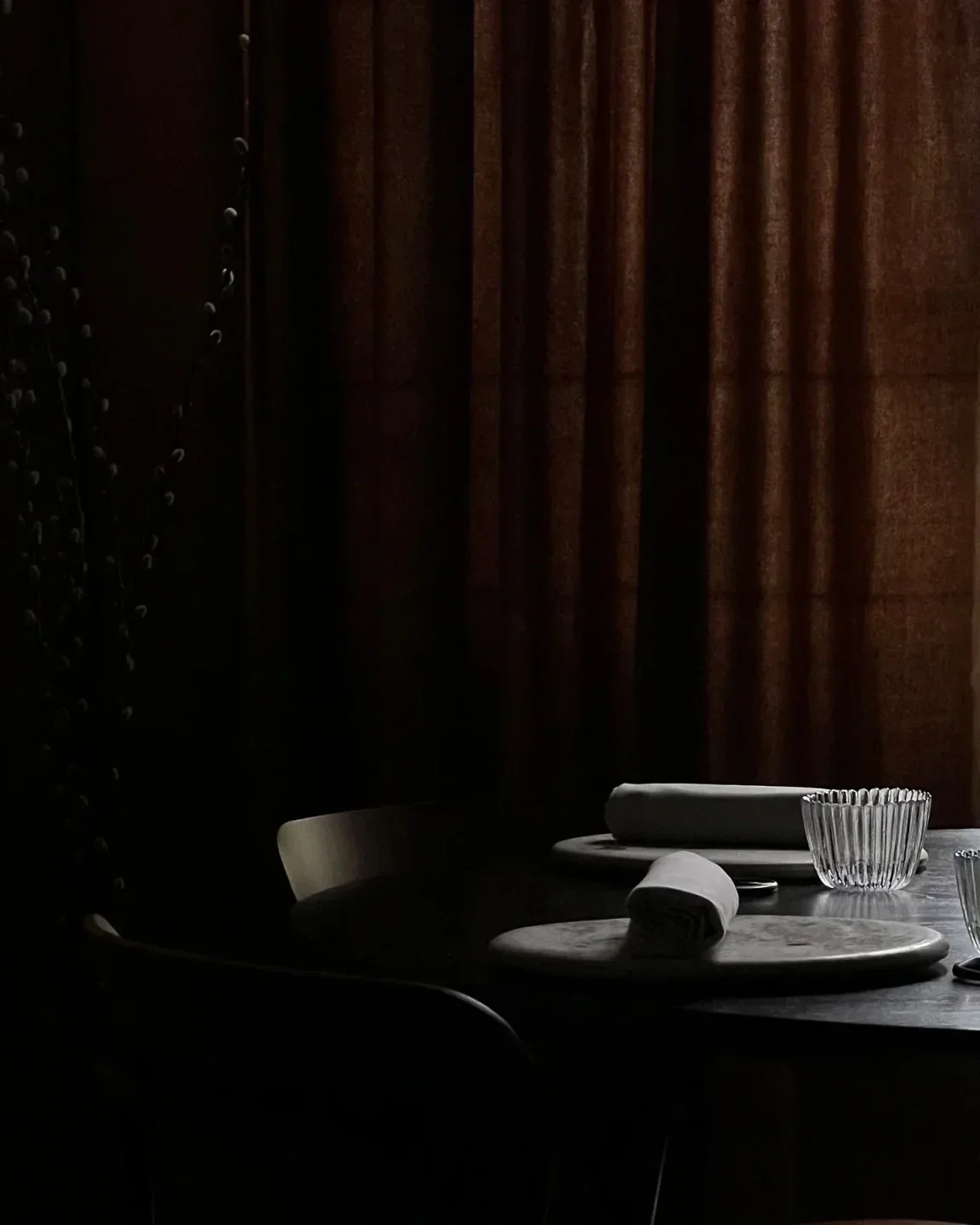 Cozy dining setting at Tèrra, Copenhagen restaurant, featuring a stylish table setting.