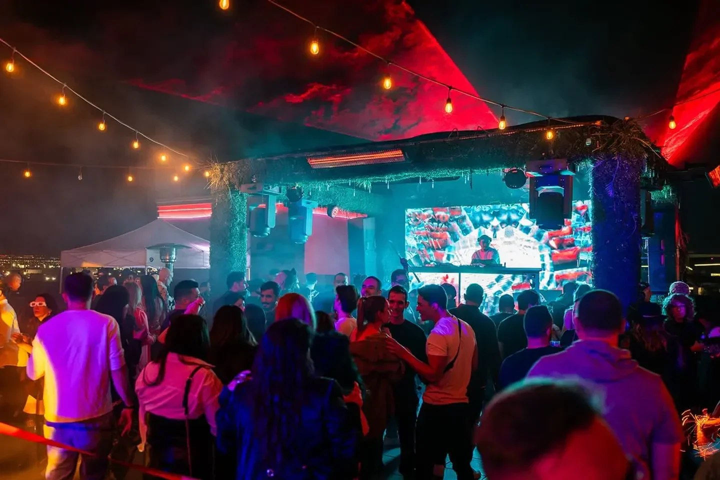 Terrace Afterhours nightclub in Las Vegas with DJ, lights, and dancing crowd.