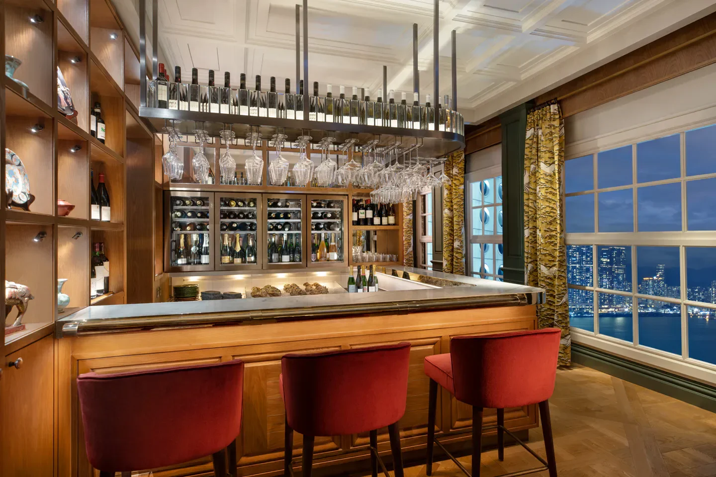 Stylish bar at The Aubrey restaurant in Hong Kong, with stunning city views.