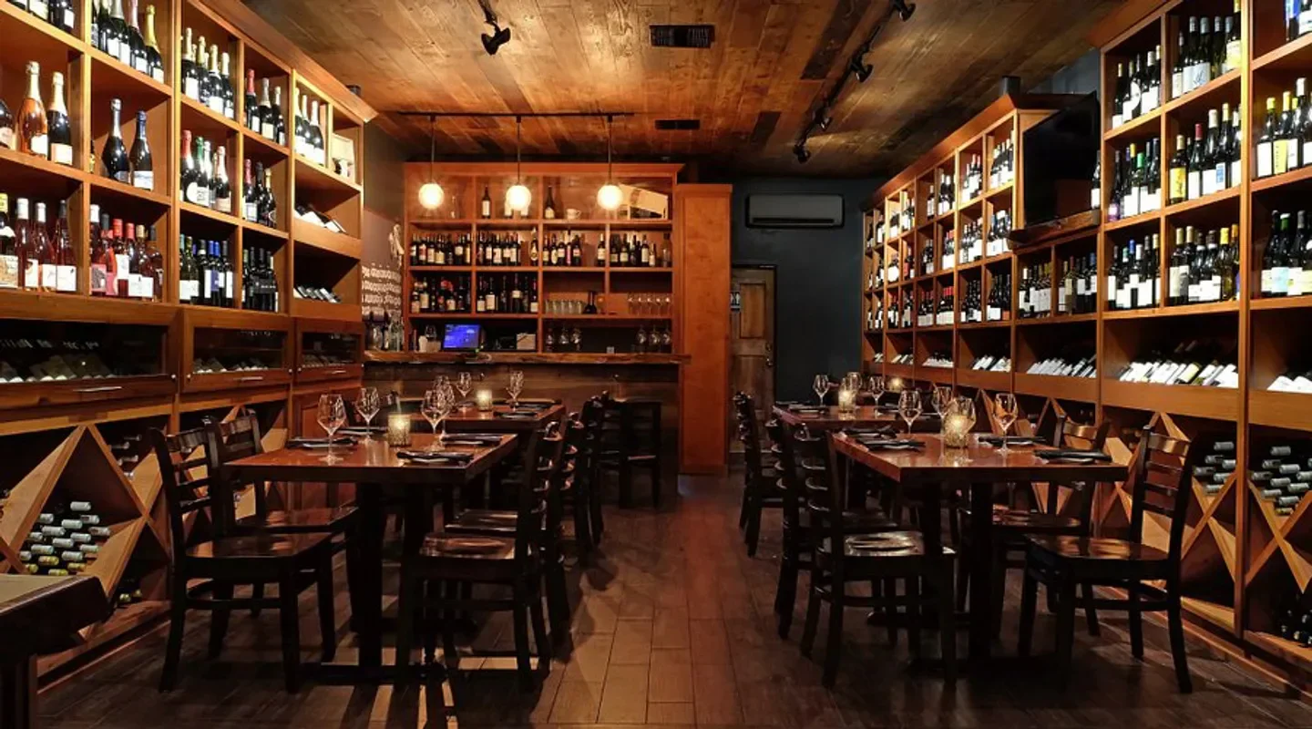 Cozy dining room at The Barrel Room restaurant in San Francisco with wine selection.