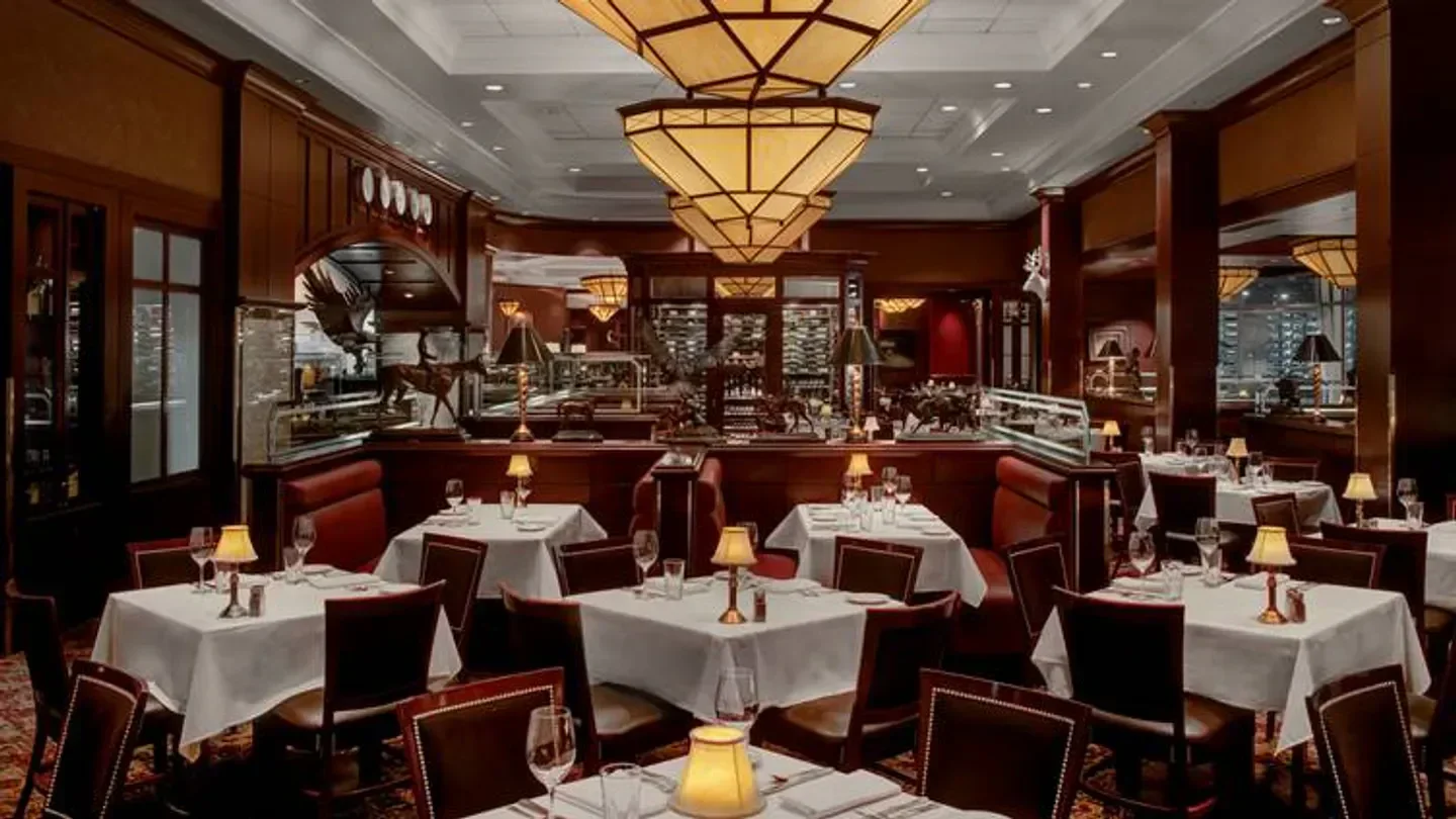Interior of The Capital Grille - Las Vegas with tables, booths, and elegant decor in Las Vegas.