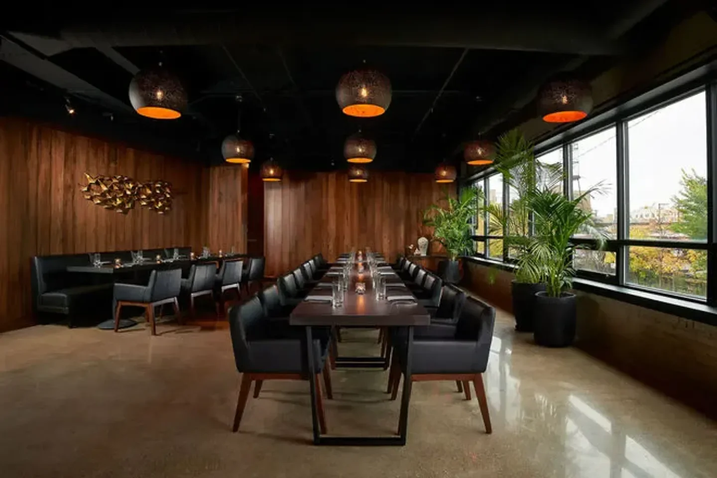 Interior of The Dining Room at Moody Tongue in Chicago, featuring elegant dining tables.