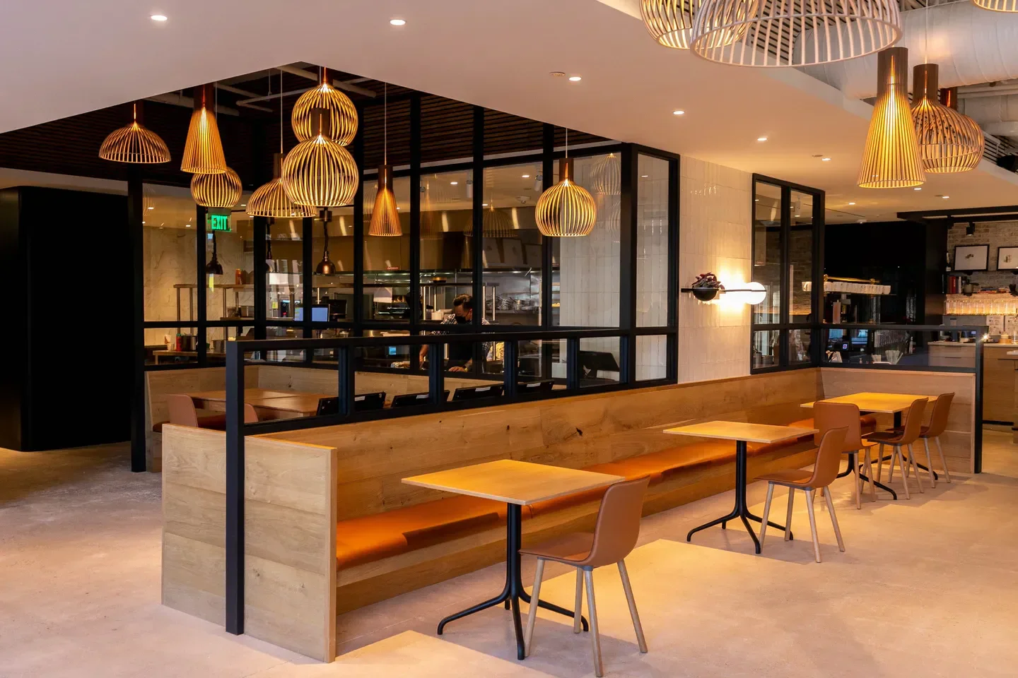 Cozy dining area at The Duck & The Peach restaurant in Washington, with stylish lighting.