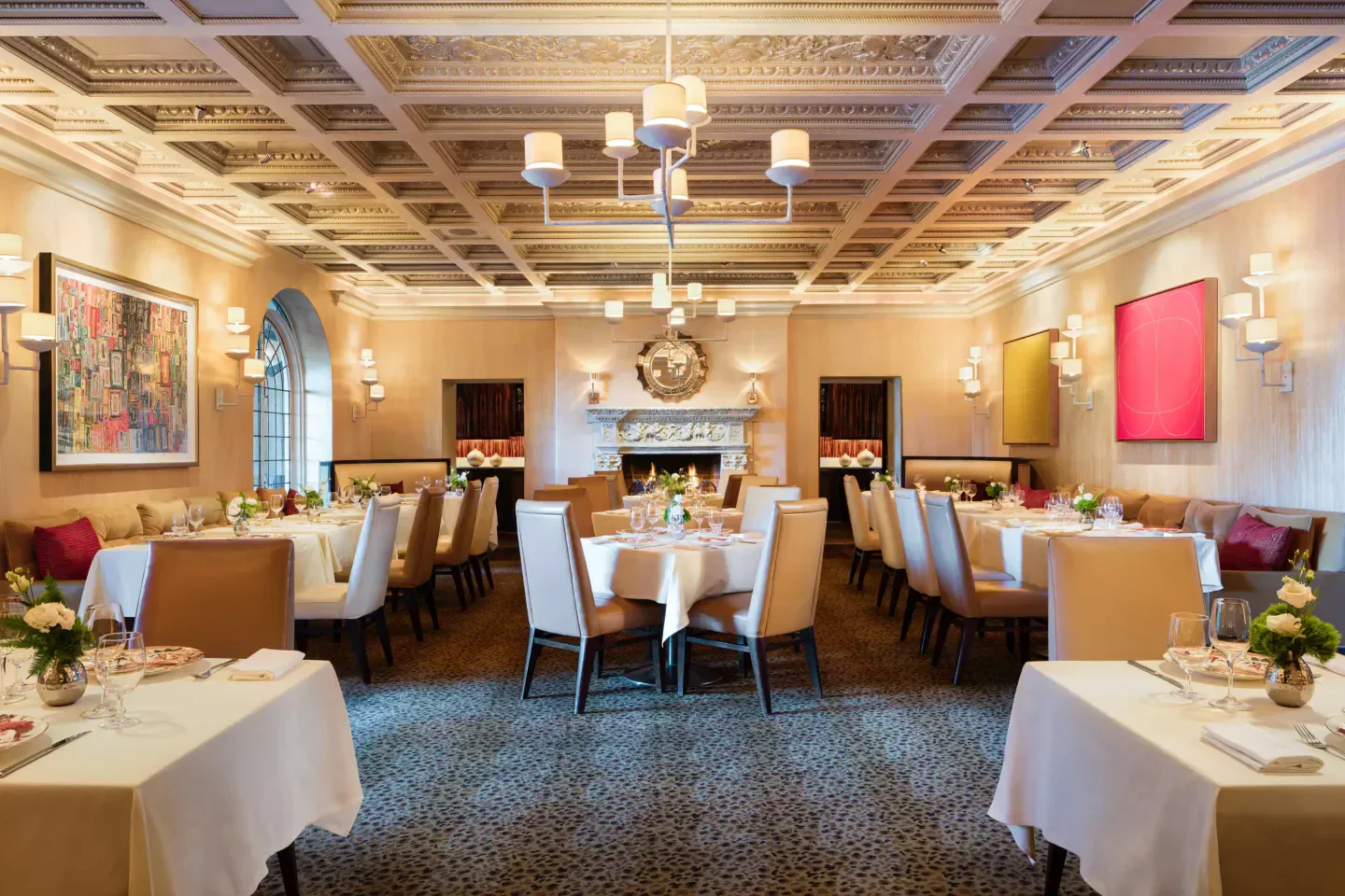 Elegant dining room interior at The Mansion Restaurant in Dallas, with fine details.