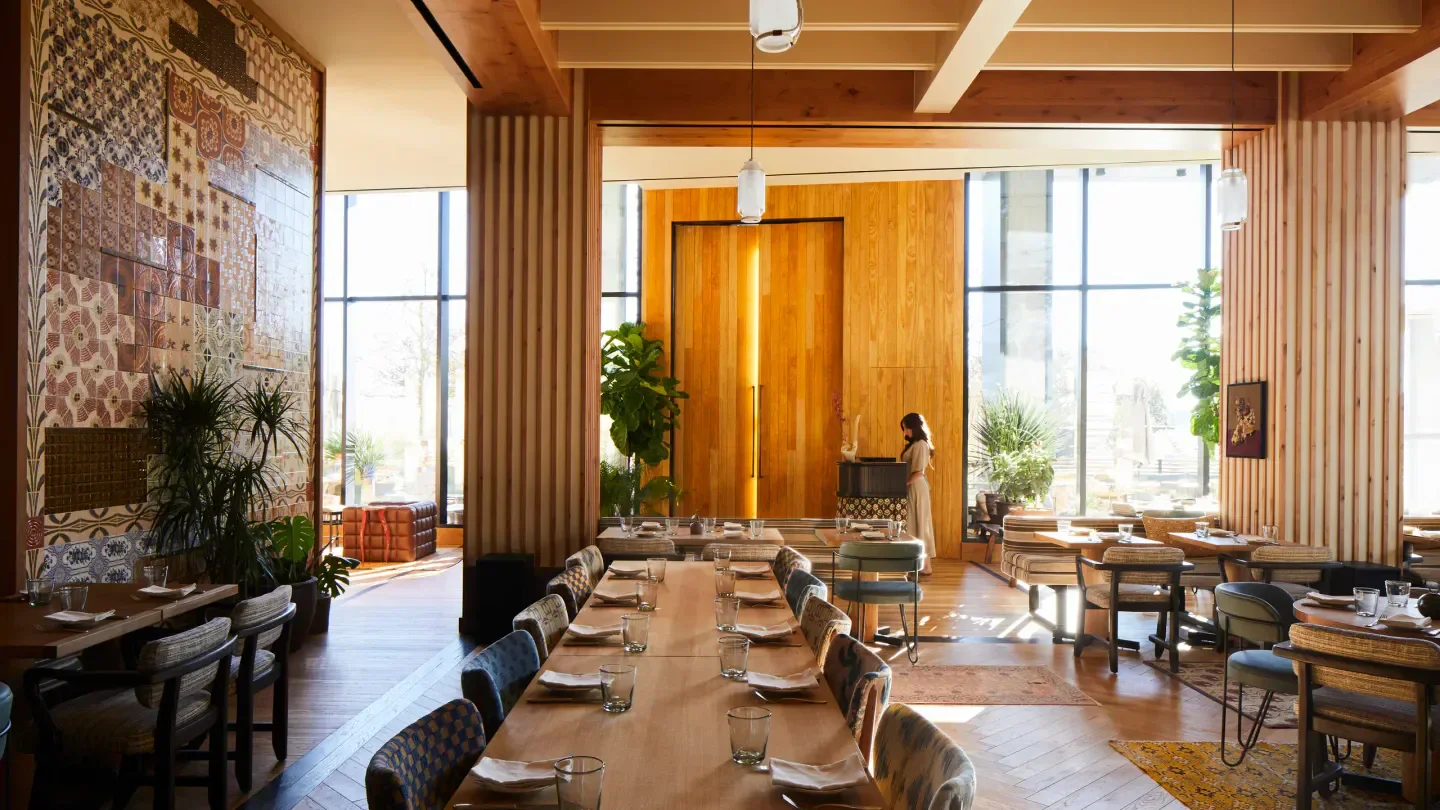Interior of The Peacock Mediterranean Grill in Austin, featuring elegant dining space.